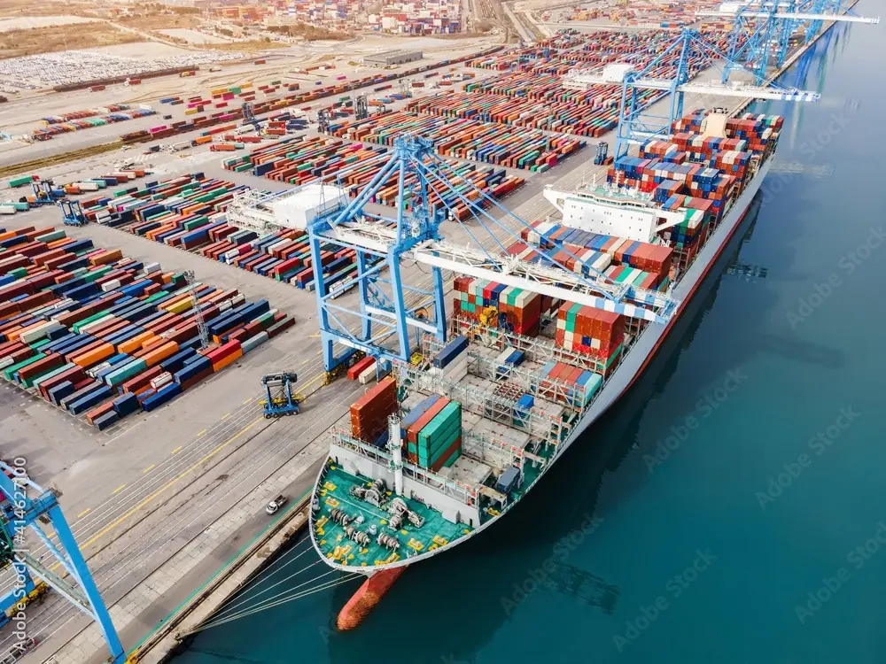 Container ship loading at port — Rice Husk Ash exported worldwide from India
